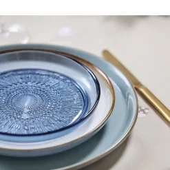 Kusintha Glastallerken